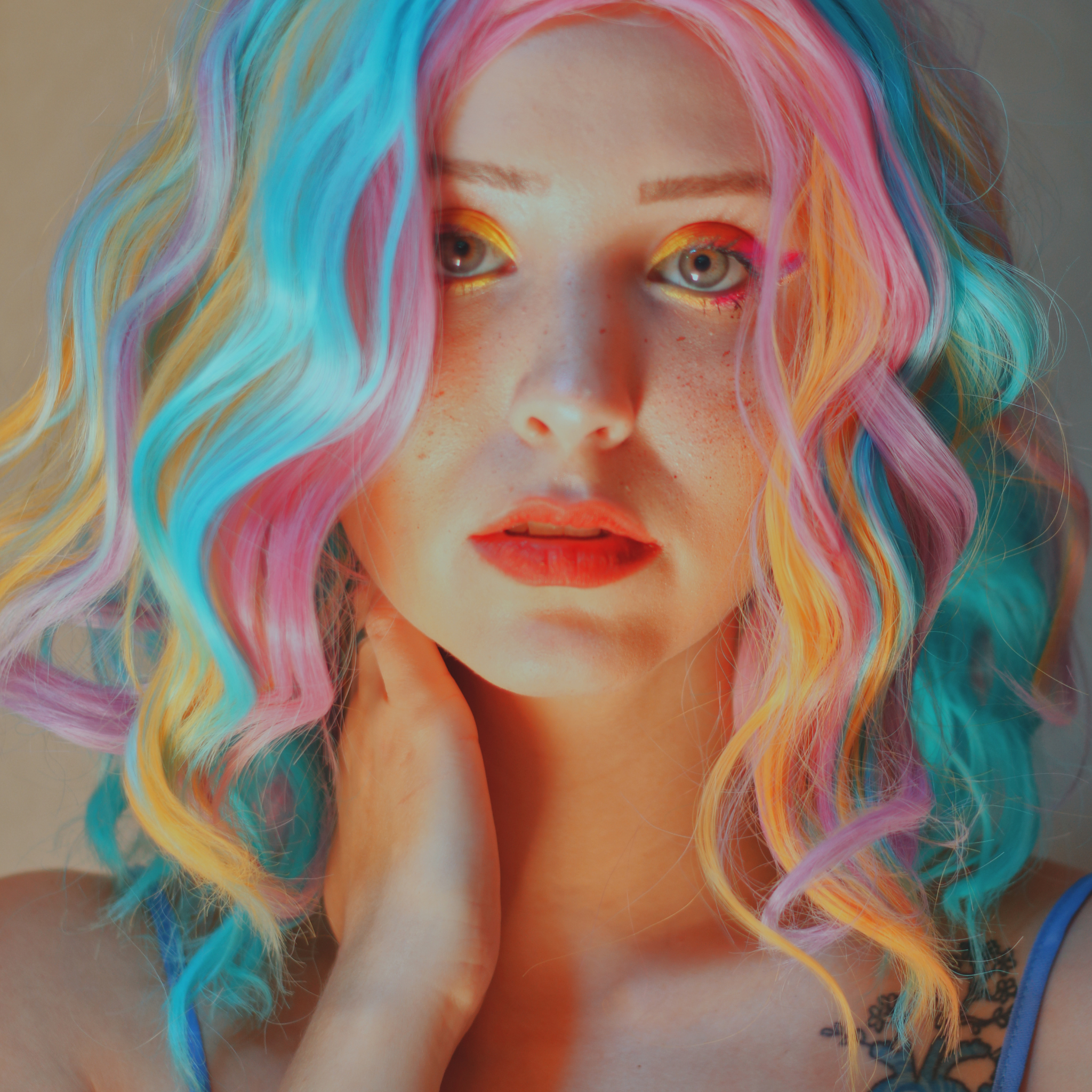 colorful rainbow hair on white freckle face girl