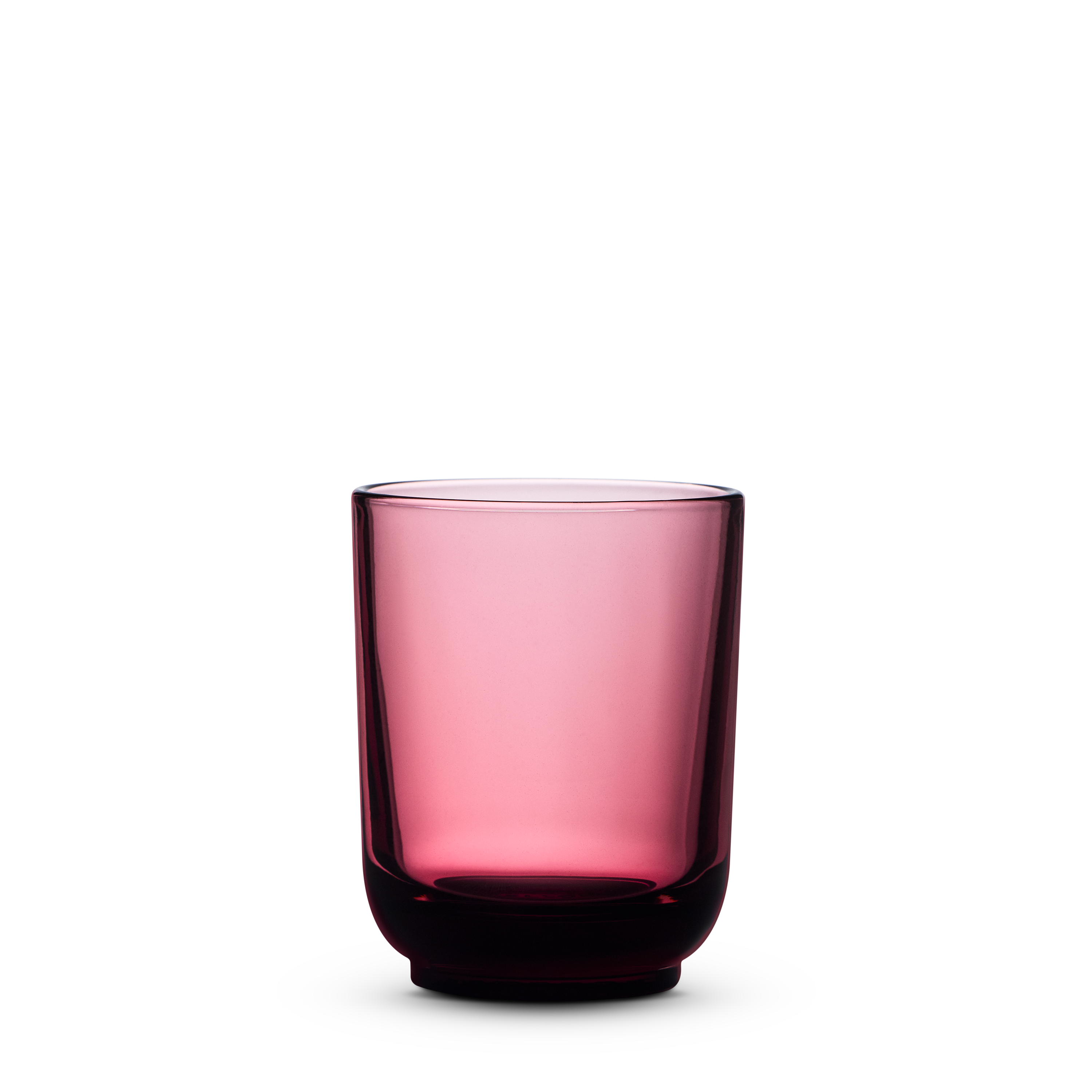 Pink glass tumbler on a white background