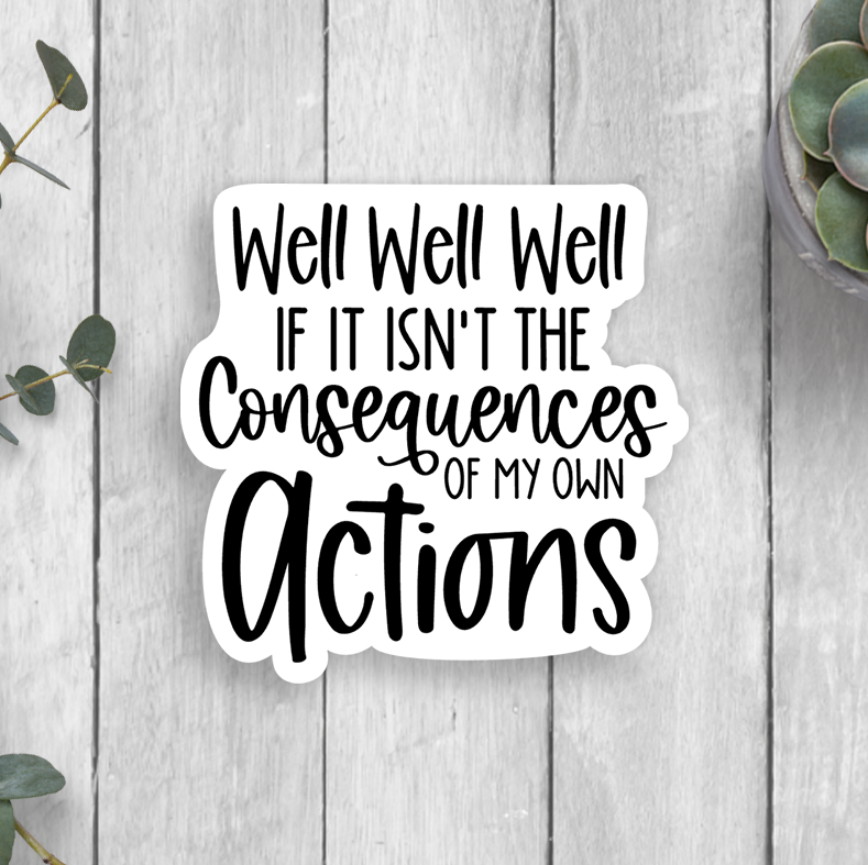 A vinyl sticker with a quote about personal actions placed on a wooden surface with green plants and a neutral background.