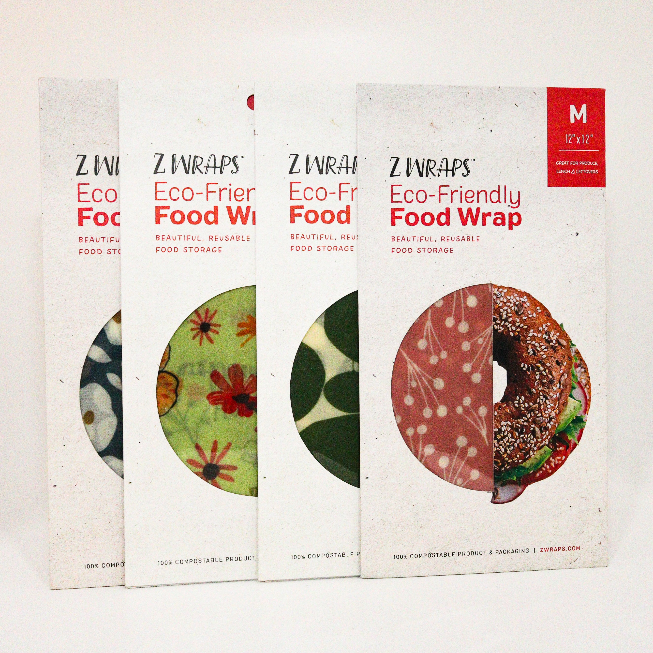 Four varieties of packages of Z Wraps Eco-Friendly Beeswax Food Wrap on a white background