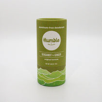 Green deodorant stick with 'Humble' branding on a white background
