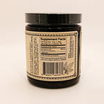 Supplement jar with label on a beige background