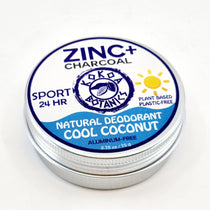 A container of Zinc & Charcoal Sport Cool Coconut Natural Deodorant with a blue and white label, indicating it is aluminum-free and suitable for sensitive skin.