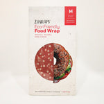 Z Wraps eco-friendly pinkish beeswax food wrap packaging with a bagel illustration on a white background
