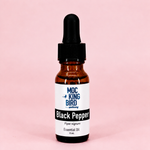 Black Pepper Essential Oil with black color band and white lettering