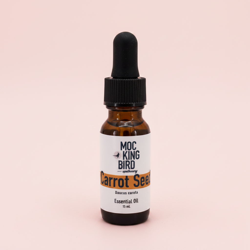 Carrot Seed Essential Oil – Blush Pink Background