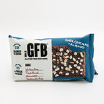 Gluten-free dark chocolate almond bar packaging on a white background