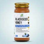 Herb To Body Black Seed Honey jar on pale cool blue background