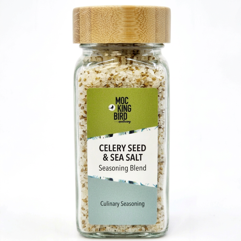 Illustrative Mockingbird Celery Seed & Sea Salt jar with bamboo lid and green, white and pale sage-blue label.