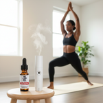 Valkyrie Essential Oil Blend – lifestyle with Wandor Diffuser, strong Black woman in warrior yoga pose in home gym