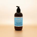 Bogüe Milk Soap No.19 Namaste Yogi Blend Goat Milk Body Lotion – hero on warm amber background