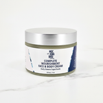 Daily Greens Superfood Face & Body Cream front label on white marble background