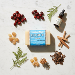 Bogüe Milk Soap No.33 Anti-Aging Wellness Blend – lifestyle flat lay with rosehip, frankincense, myrrh and carrot seed