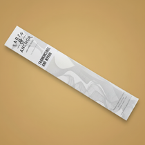 Frankincense and Myrrh incense sleeve by Earth & Anchor on warm golden amber background