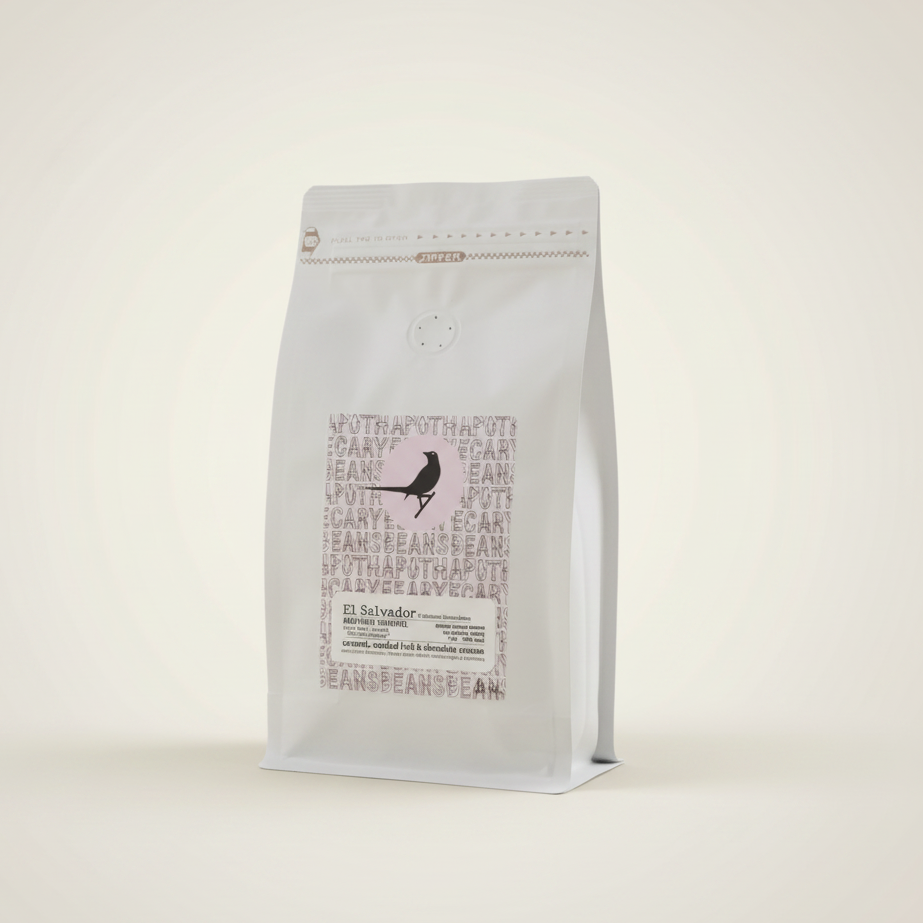 Apothecary Beans El Salvador white coffee bag on warm off-white background, clean studio hero shot