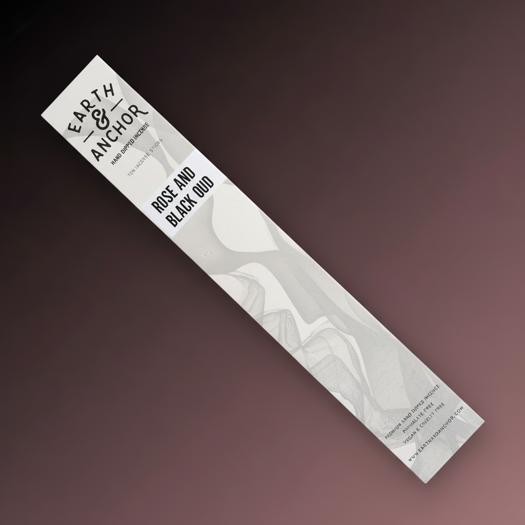 Rose and Black Oud incense sleeve by Earth & Anchor on deep mauve dark rose background
