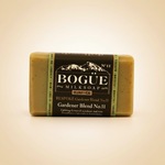 No.11 BESPOKE Gardener Blend Goat Milk Bar Soap – hero product shot on warm amber background
