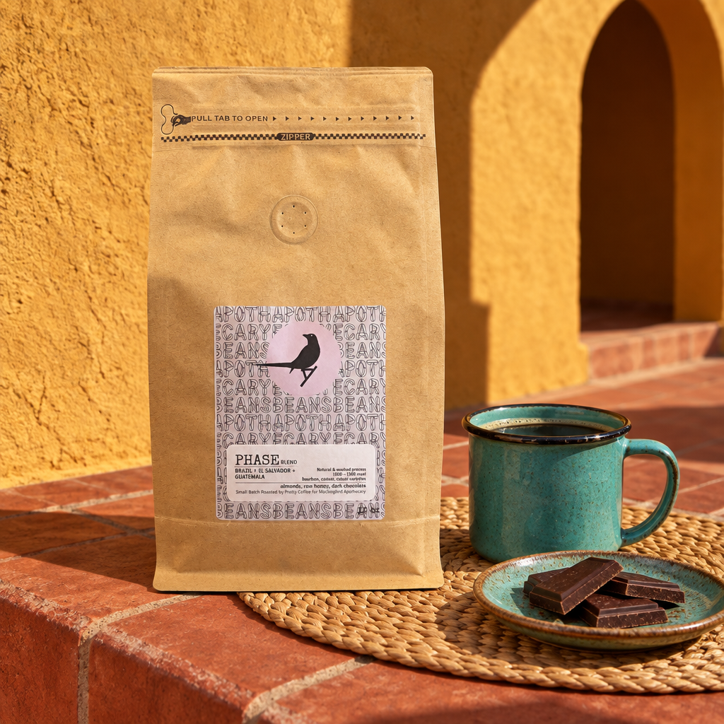 Phase Blend coffee on a terracotta tiled ledge with a turquoise cup and dark chocolate