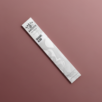 Dragon's Blood incense sleeve by Earth & Anchor on muted burgundy background