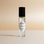 Adia Diamond Fragrance Oil rollerball on pale warm amber background