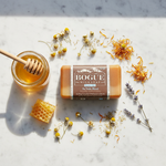 Bogüe Milk Soap No.37 Su Nido – lifestyle flat lay with honey, chamomile, calendula and lavender