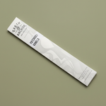 Patchouli Vanilla incense sleeve by Earth & Anchor on muted olive sage green background