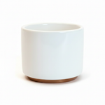 Fellow Monty double wall ceramic cappuccino cup in white with bronze base ring on white background