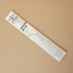 Sandalwood and Teak incense sleeve by Earth & Anchor on warm earthy tan greige background