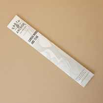 Sandalwood and Teak incense sleeve by Earth & Anchor on warm earthy tan greige background