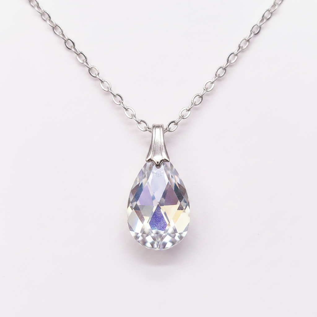 Crystal AB teardrop pendant necklace on silver chain, clean white background