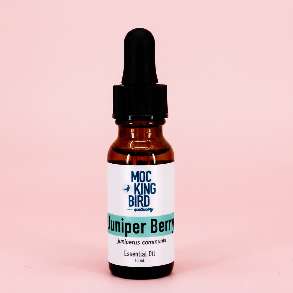Juniper Berry Essential Oil – Pink Background