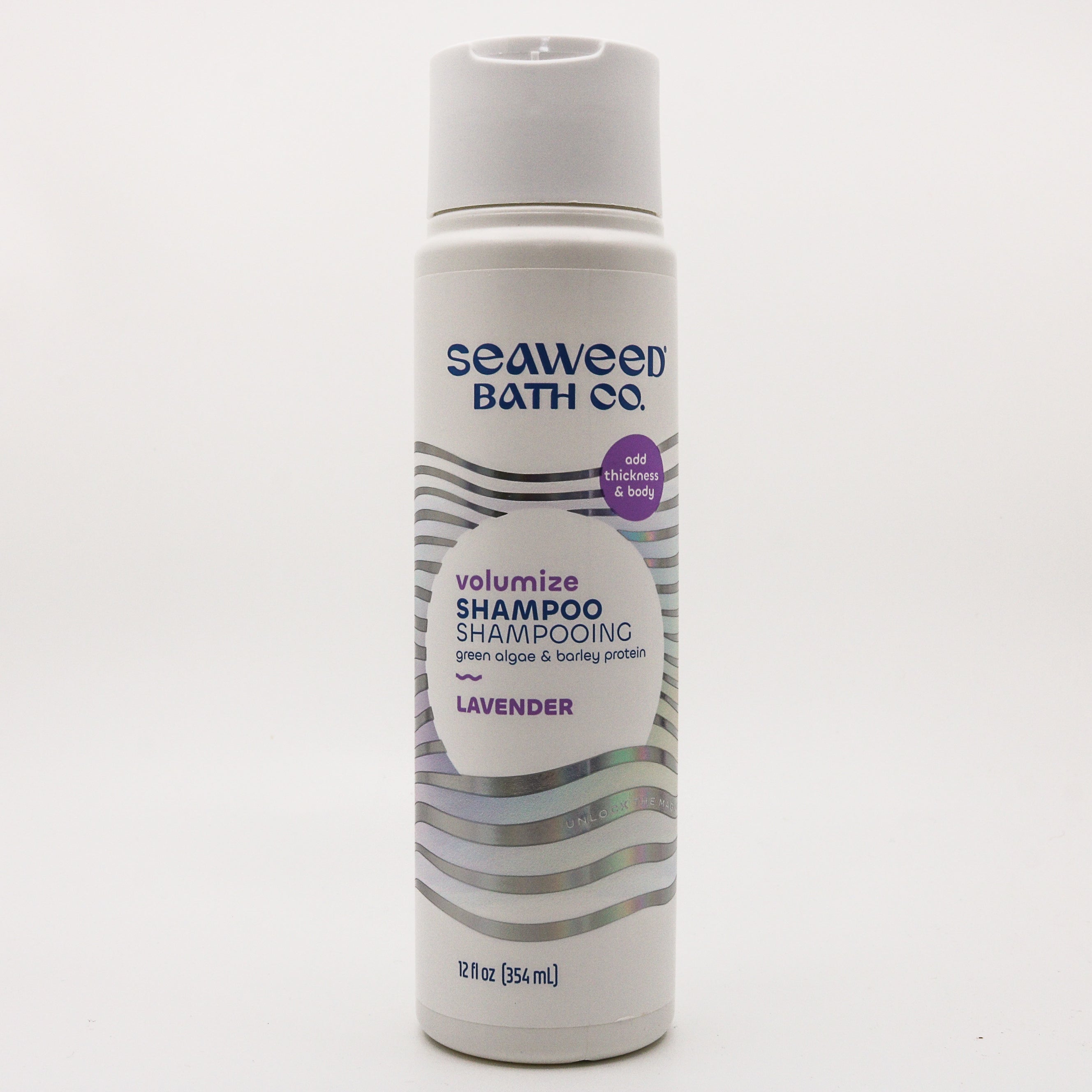 seaweed bath co volumize shampoo lavender white bottle on a white background