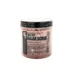 Jar of luxury sugar scrub with a black label on a white background