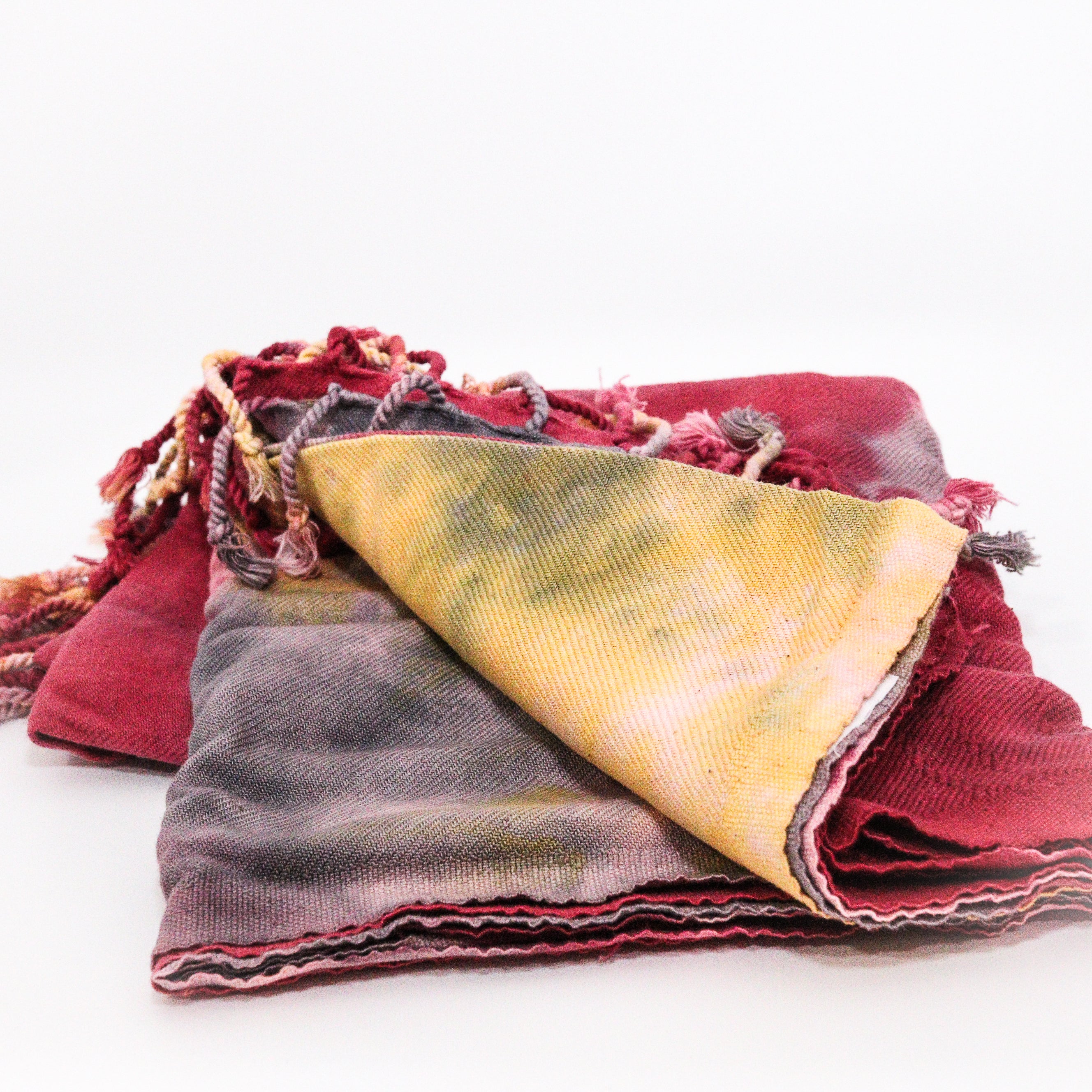 Turkish towel dark sunspots colorful organic cotton on a white background