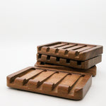Teak Wood dark stained soap dish with multiple drip drains on a white background